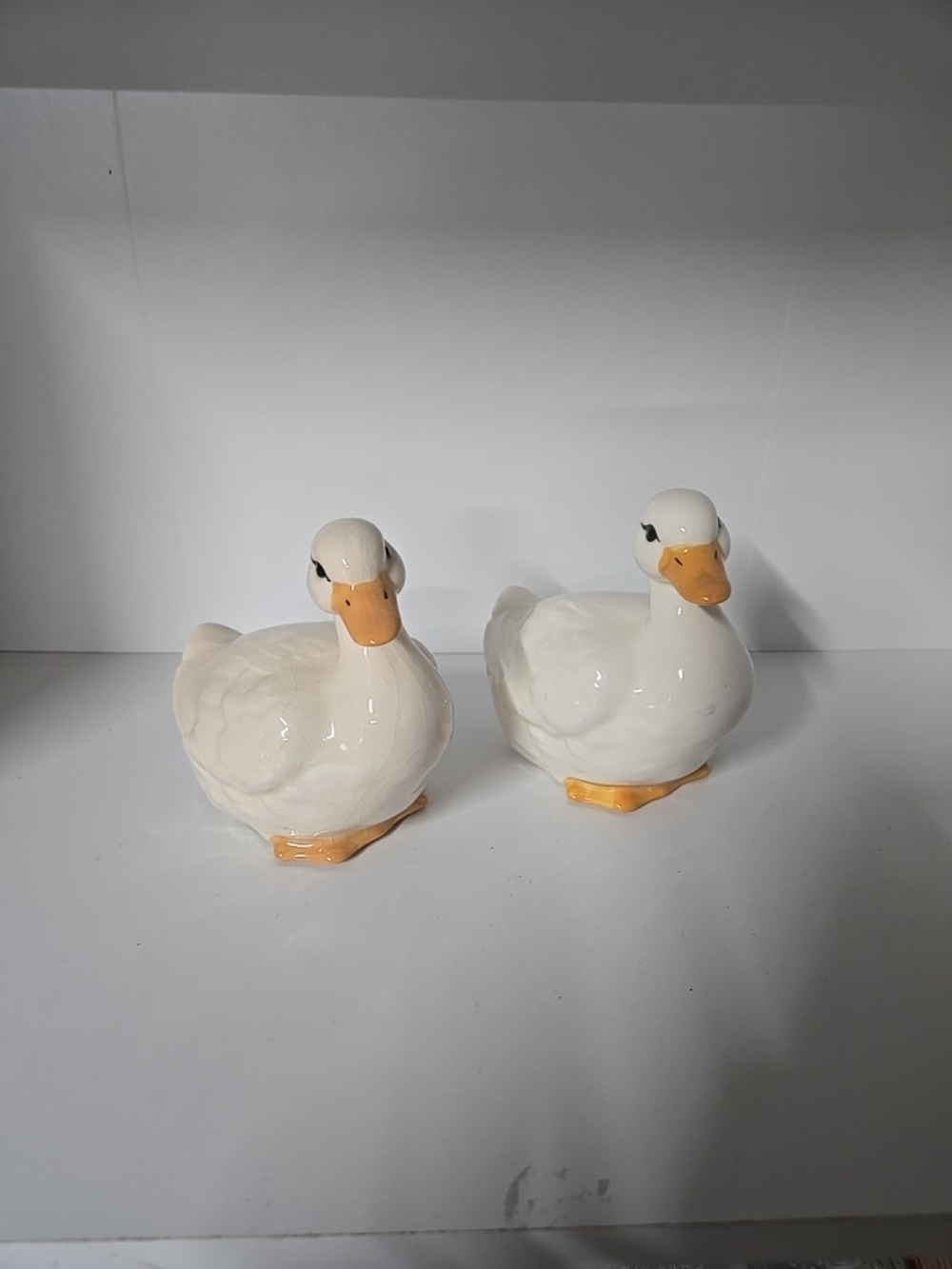 Pair of Vintage White Ceramic Duck Figurines with Orange Beaks